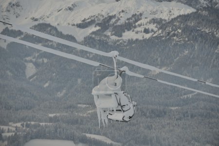 Cabin lifts in the snowy high mountains