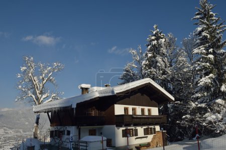 Alpine hut in winter