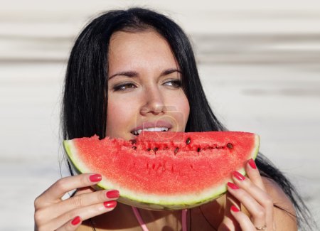 girl eats a water-melon