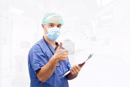 Doctor physician approval OK hand sign isolated in operating roo