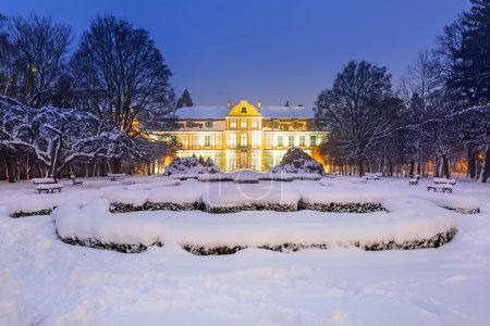 Winter scenery of Abbots Palace in snowy park of Gdansk