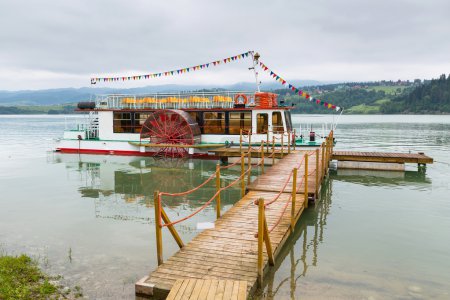 Boat at wooden pier on the Czorsztyn lake