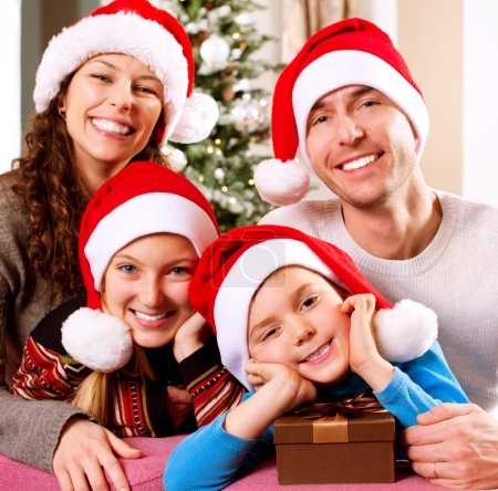 Christmas Family with Kids. Happy Smiling Parents and Children