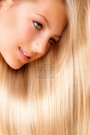 Beautiful Blond Long Hair. Blonde Girl Close-up Portrait