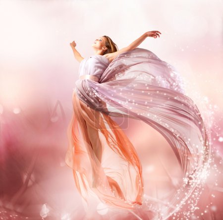 Fairy. Beautiful Girl in Blowing Dress Flying. Magic