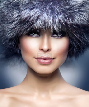 Fashion. Beautiful Girl in Fur Hat. Winter Woman