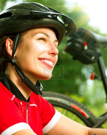 Young Woman Riding Bicycle