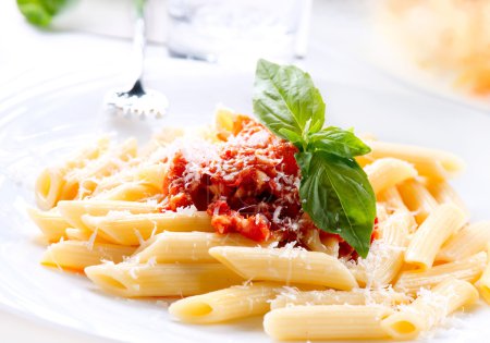Pasta Penne with Bolognese Sauce, Basil and Parmesan