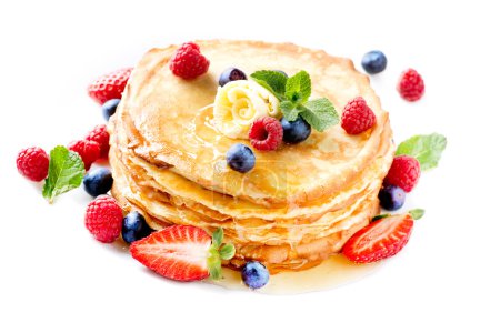 Pancake. Crepes With Berries. Pancakes stack isolated on White