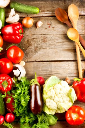 Healthy Organic Vegetables on a Wood Background