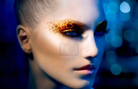 Beauty Fashion Model Girl with Holiday Leopard Makeup
