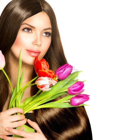 Beauty Woman with Spring Bouquet of Tulip Flowers