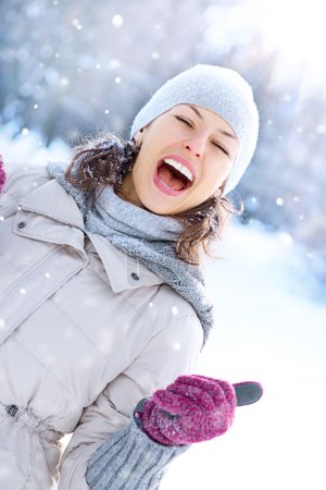 Winter Woman Outdoor. Happy Laughing Girl Having Fun