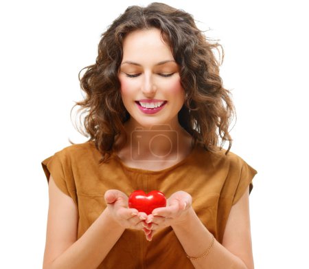 Beauty Young Woman with Valentine Heart in her hands