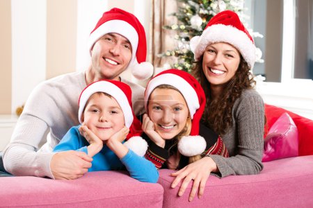 Christmas Family with Kids. Happy Smiling Parents and Children