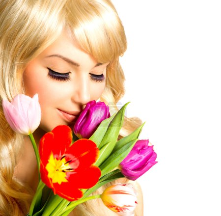 Beauty Woman with Spring Flower bouquet