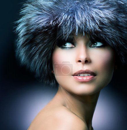 Winter Fashion. Fur Hat. Beautiful Girl in Furry Hat