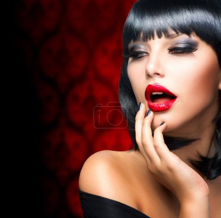 Beautiful Brunette Girl Portrait.Makeup. Sensual Red Lips