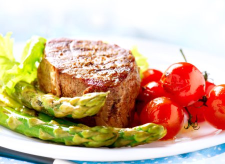 Grilled Beef Steak Meat with Fried Potato, Asparagus, Tomatoes