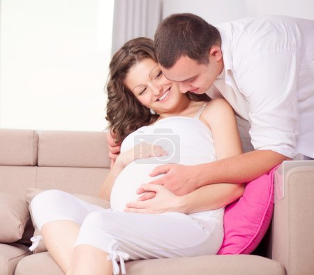 Beautiful Pregnant Woman and Her Husband Expecting Baby