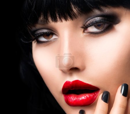 Beautiful Brunette Girl Portrait. Face. Makeup. Sensual Red Lips