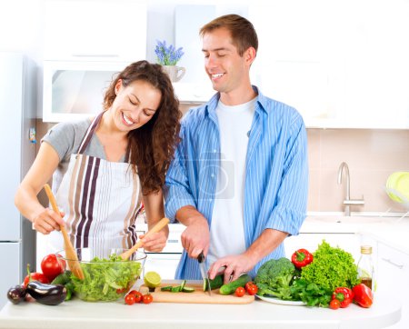 Happy Couple Cooking Together. Dieting. Healthy Food