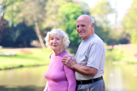 Portrait of happy loving senior couple outdoors