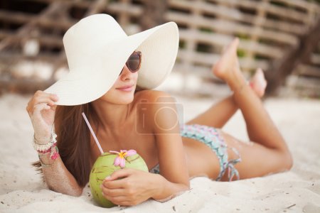 Beautiful woman with coconut