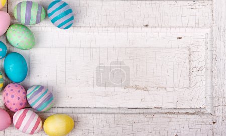 Easter eggs on a cracked antique background