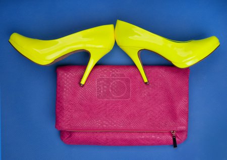 Colorful high heels and snakeskin print bag