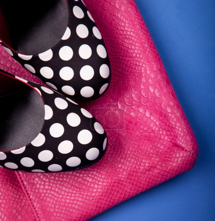 Colorful high heels and snakeskin print bag