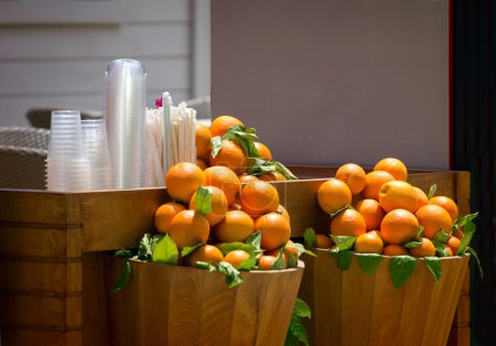 orange in wooden basket 