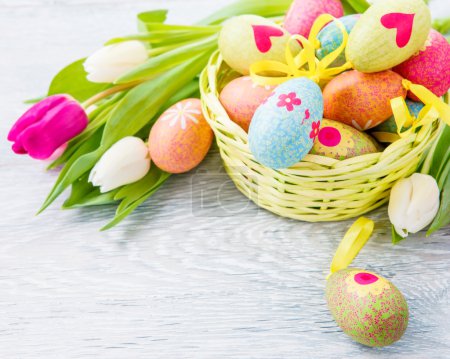Easter eggs lying in basket