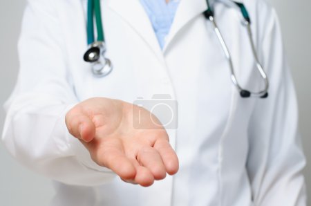 Female doctor showing her palm