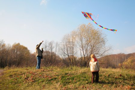Grandfather and the grandson with kite