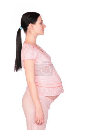 Pregnant girl posing sideview