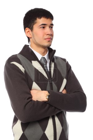 Young asian businessman in sweater with crossed hands