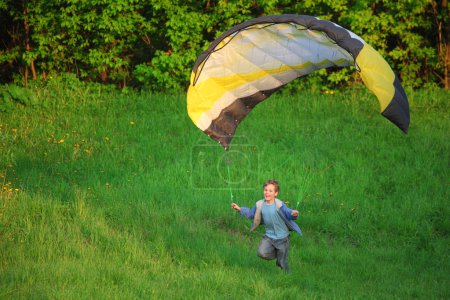 Boy and parachute