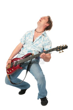 Young man with guitar dancing