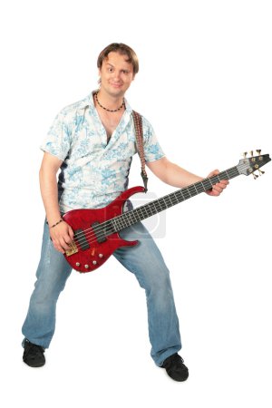 Young man with guitar dancing