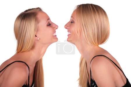 Twin girls face-to-face close-up