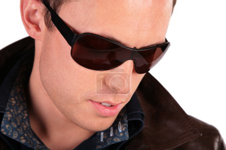 Close-up portrait of man in sunglasses