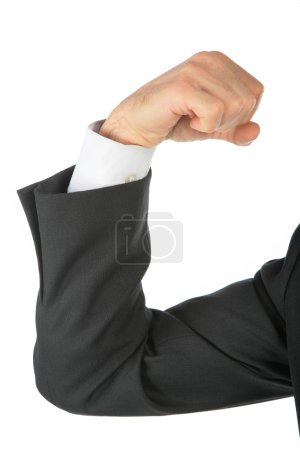 Clenched fist, arm in business suit
