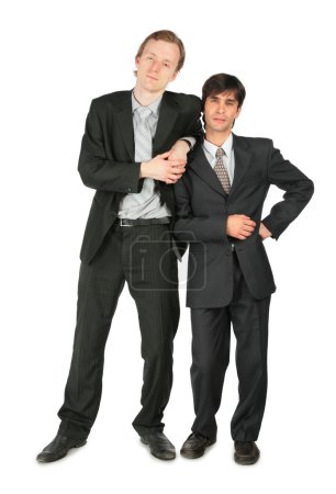 Two businessmen stands