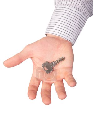 Hand holds key