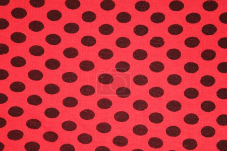 Red with black spots textile texture