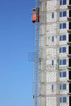 Lift on wall of under construction building