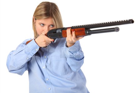 Young woman with shotgun