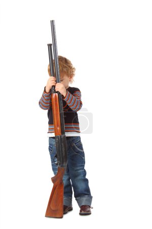 Little boy with gun