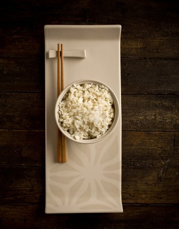 Rice with asian chopstick